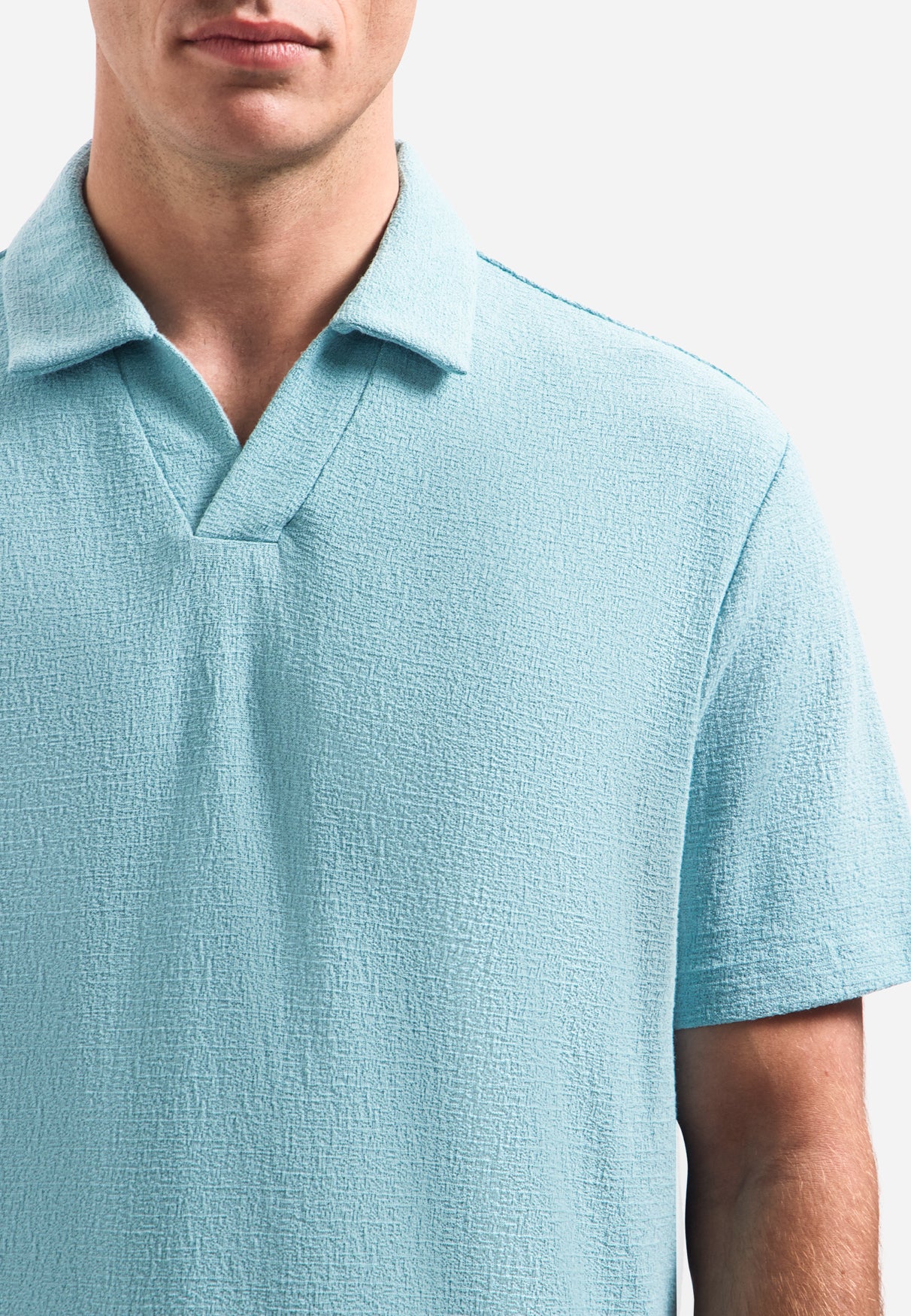 Kurzärmeliges Polo mit strukturiertem V-Ausschnitt | Seablue